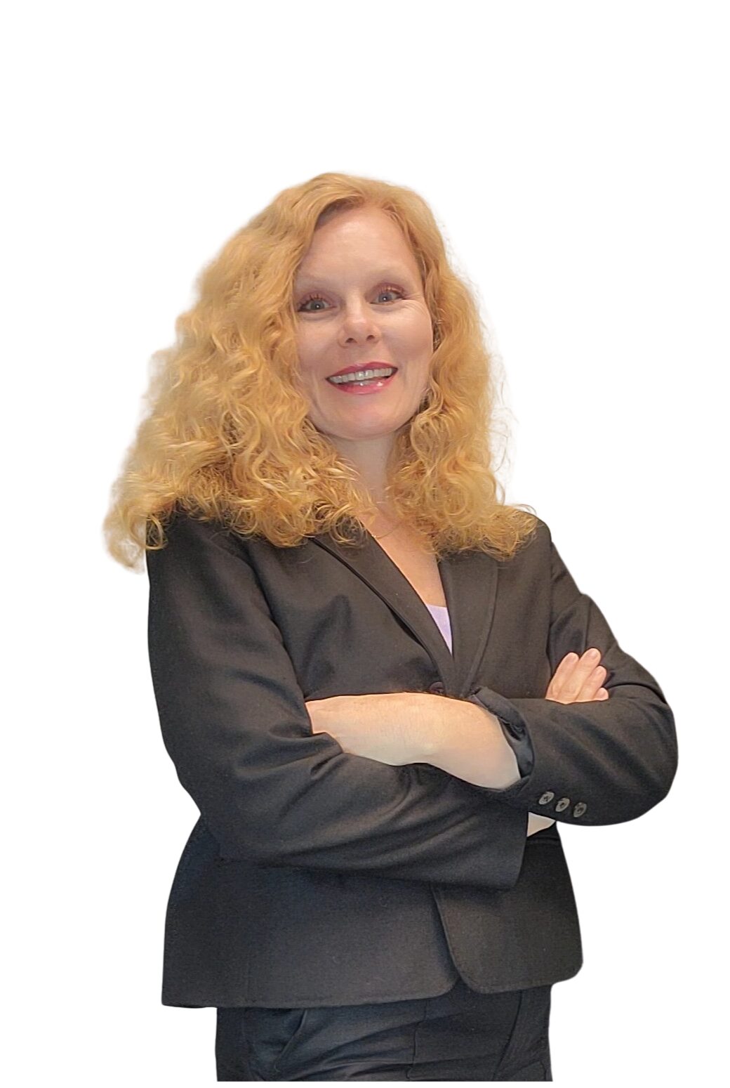 Woman with curly blonde hair wearing a black blazer, smiling with arms crossed.