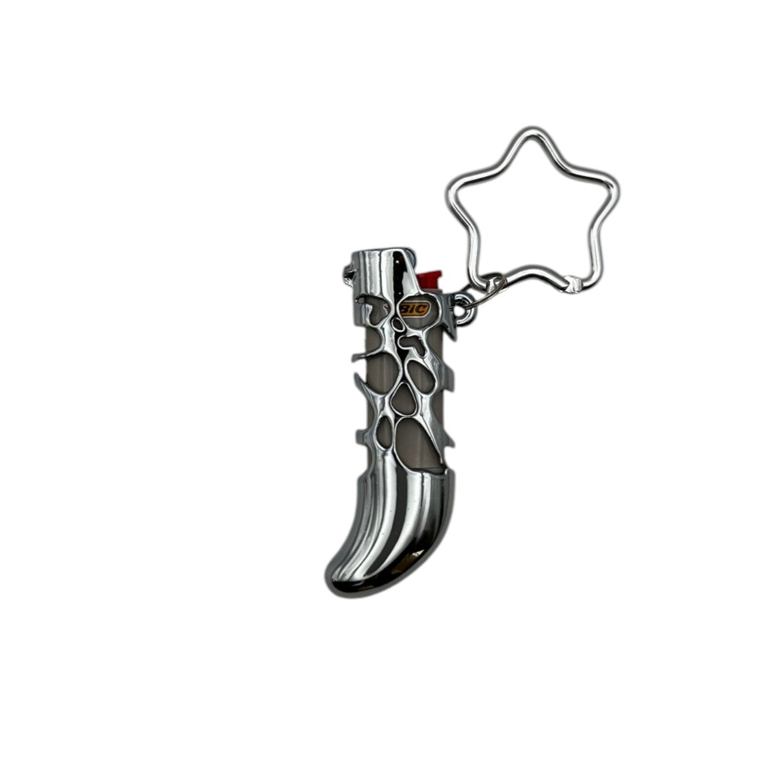 A metallic object with a star-shaped handle and a curved, textured body.