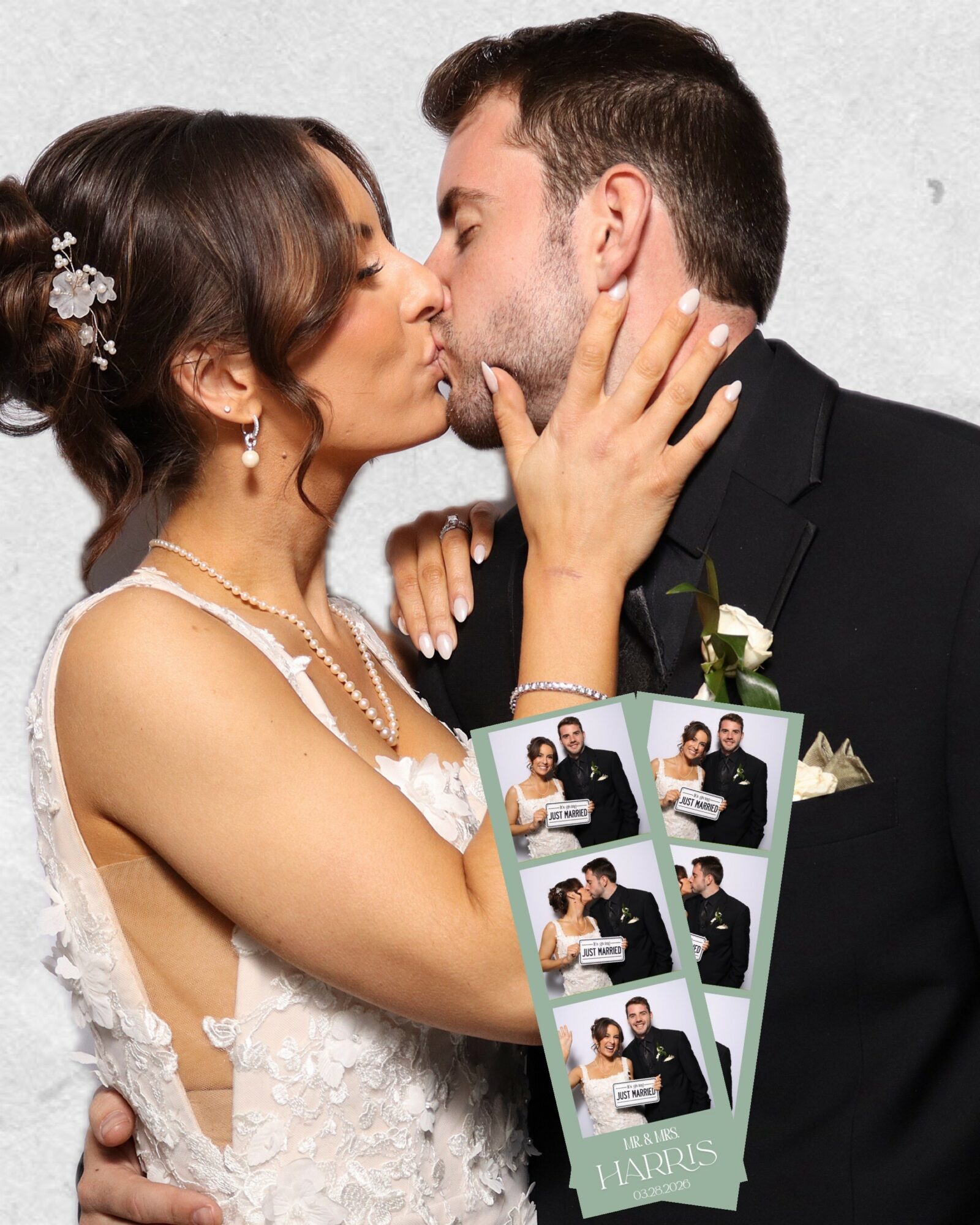 Couple kissing, woman in wedding dress, man in suit, holding photo booth strips, close-up, white background.