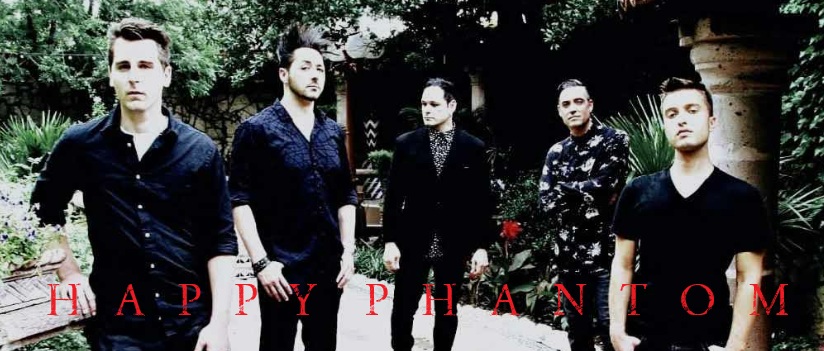 Five men standing outdoors with trees and a building in the background, some wearing dark clothing, with red text at the bottom.