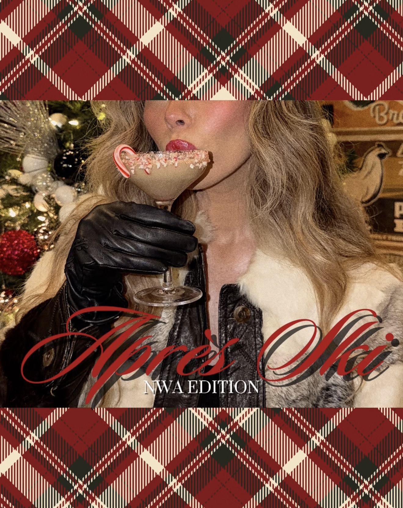 Woman with wavy hair holding a decorated glass, wearing a black glove and white coat, Christmas decorations in background.