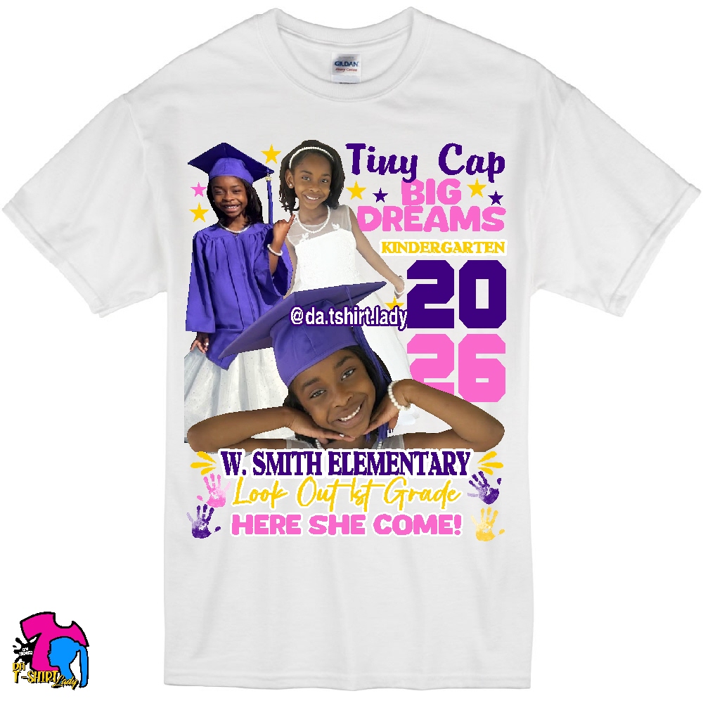 White T-shirt with three children in graduation caps and gowns, colorful text, and decorative elements.