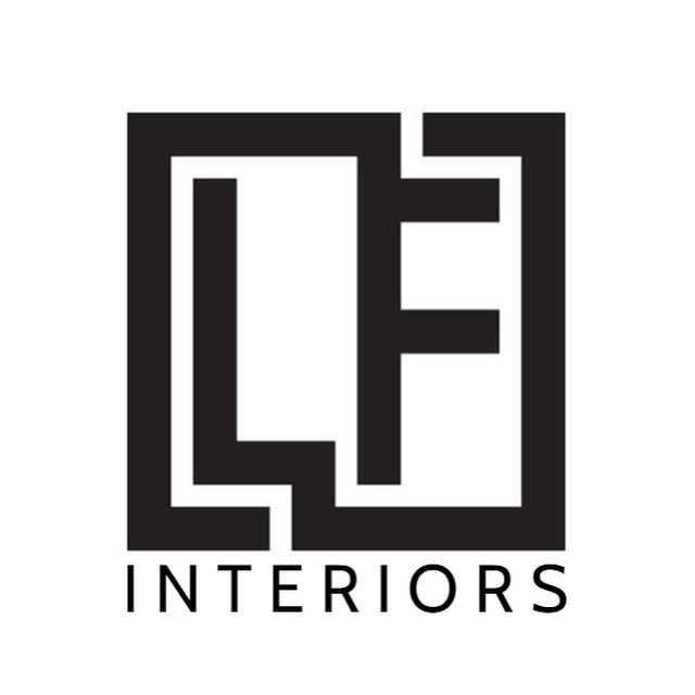 A black and white logo with the text 'INTERIORS' below a geometric design.