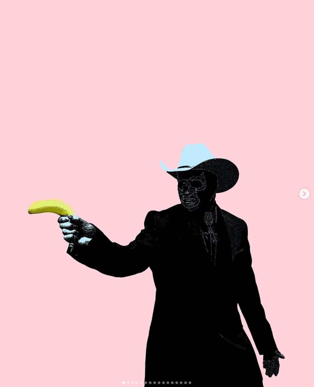Silhouette of a person wearing a hat, holding a banana, against a pink background.