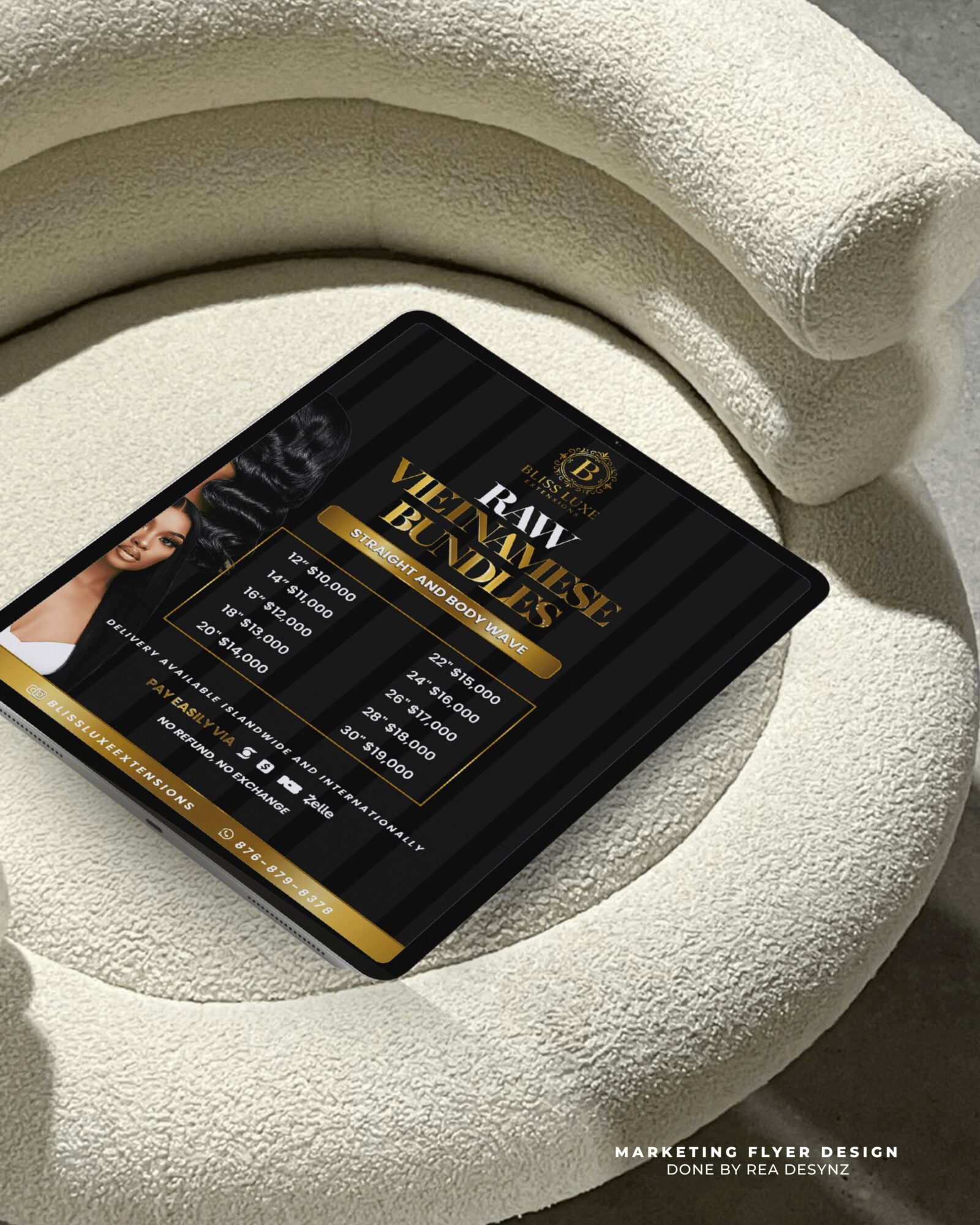 Tablet displaying a marketing flyer design with text and images, placed on a textured, curved surface.