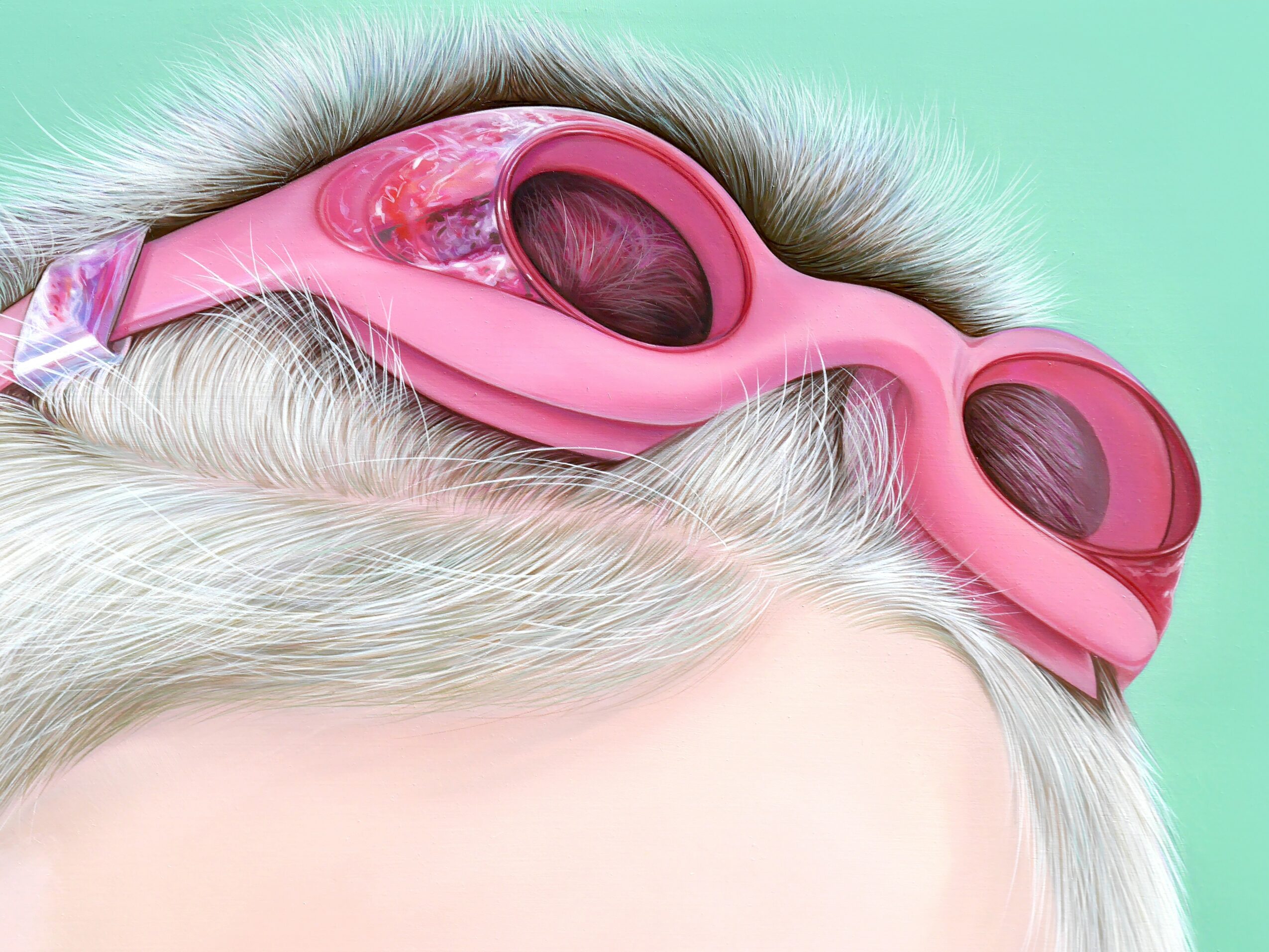 Close-up of a person with white hair wearing pink goggles on their head, against a light green background.
