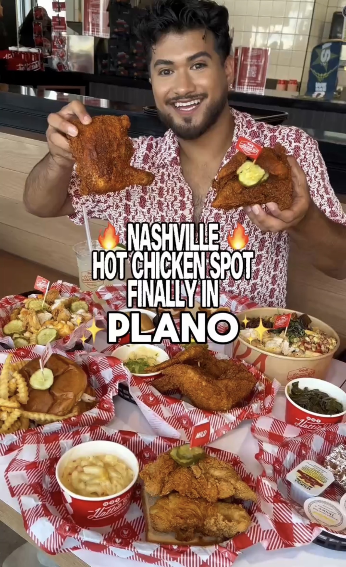 Man smiling at table with fried chicken, sides, and drinks in a restaurant, promoting Nashville hot chicken in Plano.