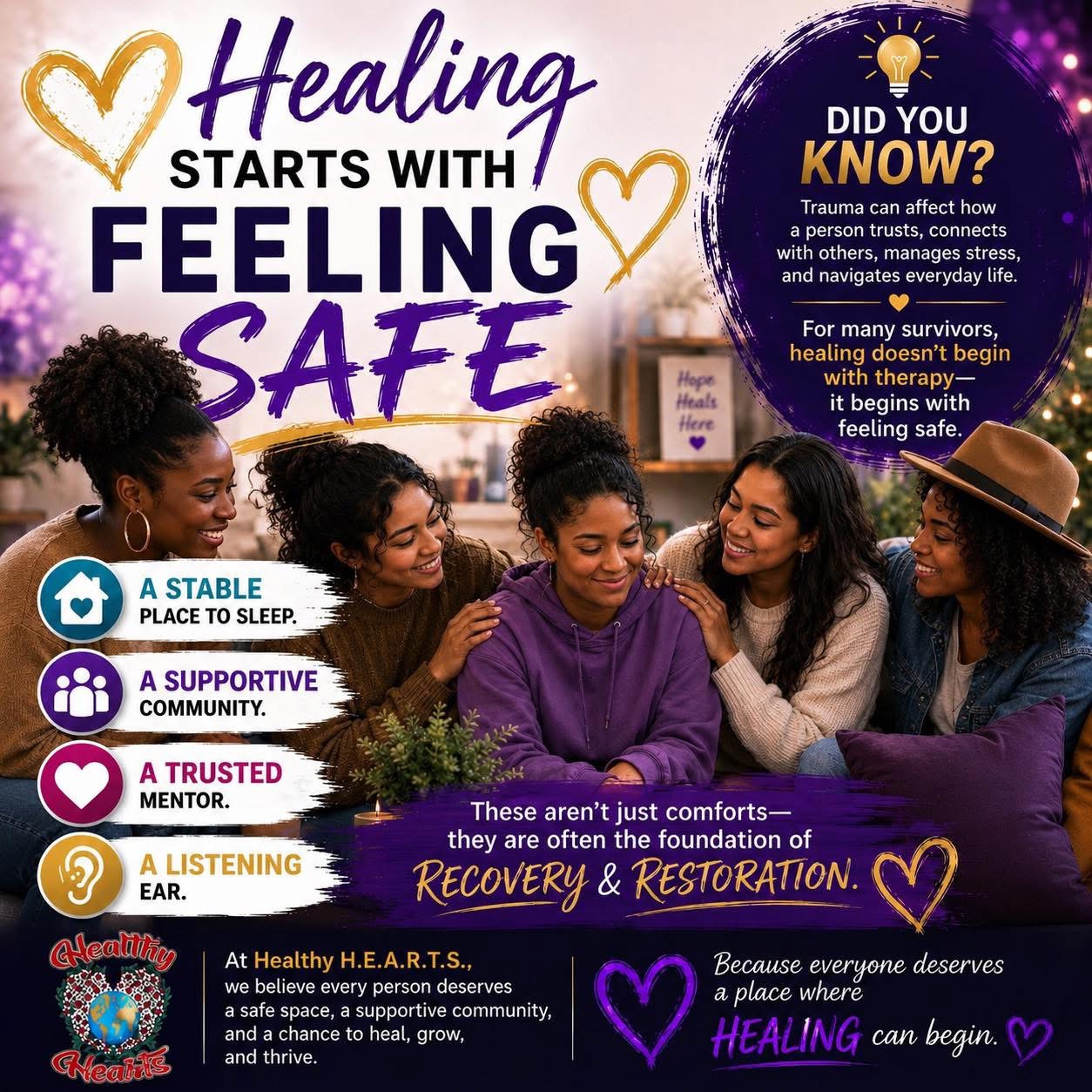 Group of five diverse women sitting together, smiling, with purple flowers in front, in a wellness or support setting.