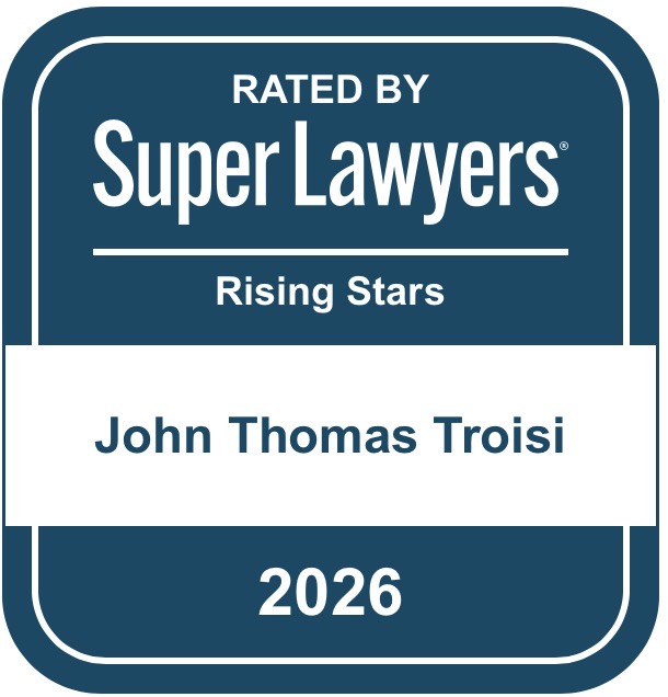 A badge with text indicating a legal rating, a name, and the year 2026, with a blue and white color scheme.