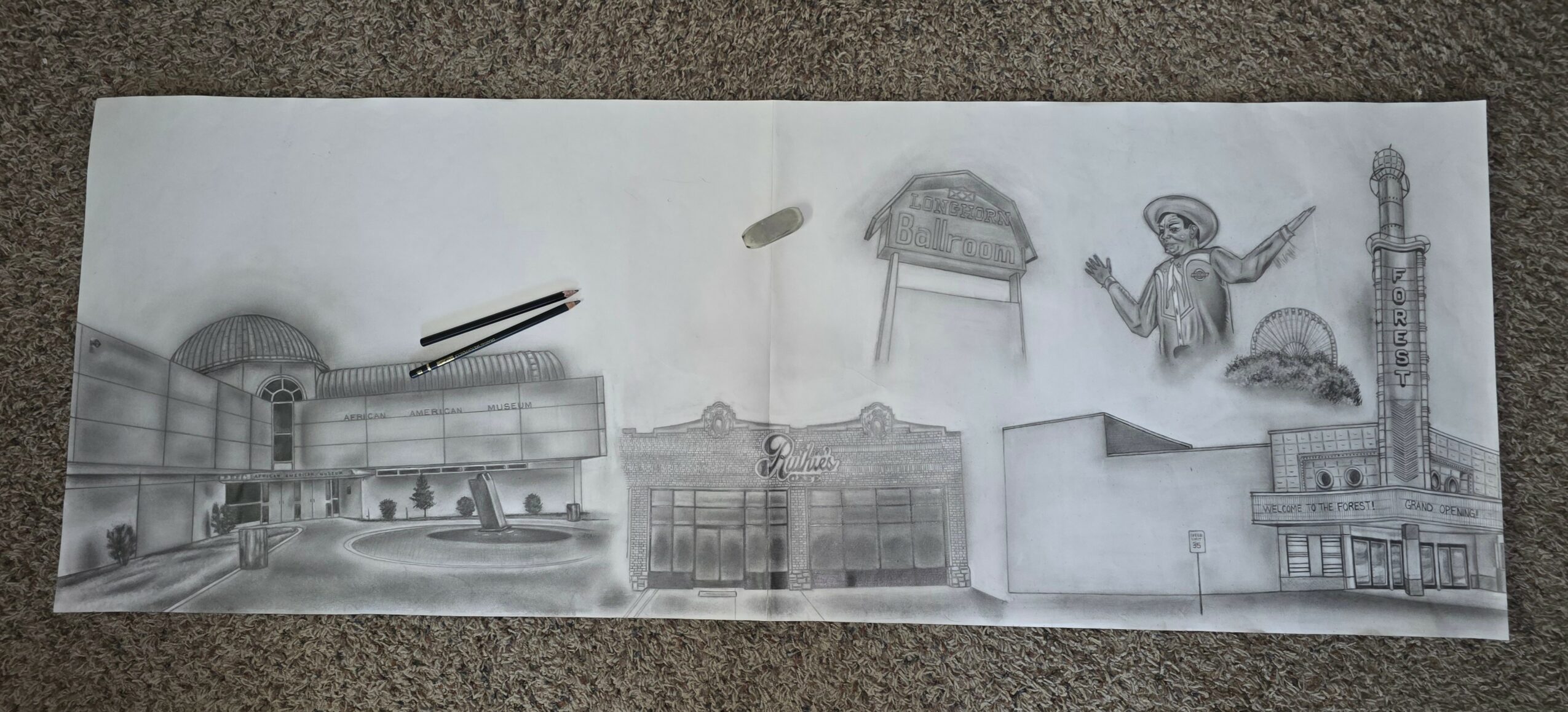 Sketch of a cityscape with buildings, a bridge, a statue, and a tower, drawn in pencil on paper.