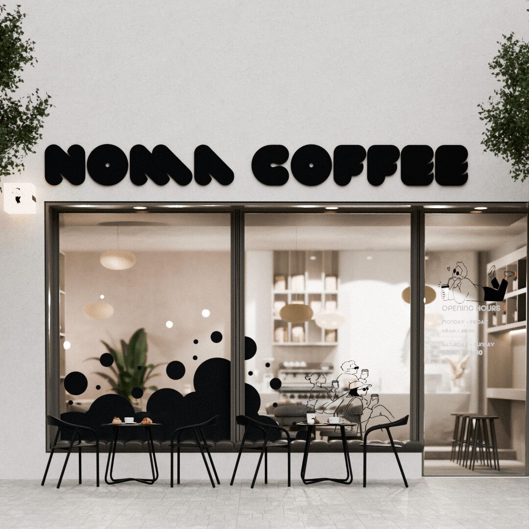 Coffee shop with large glass windows, outdoor seating, and a sign reading 'NOMA COFFEE' above the entrance.