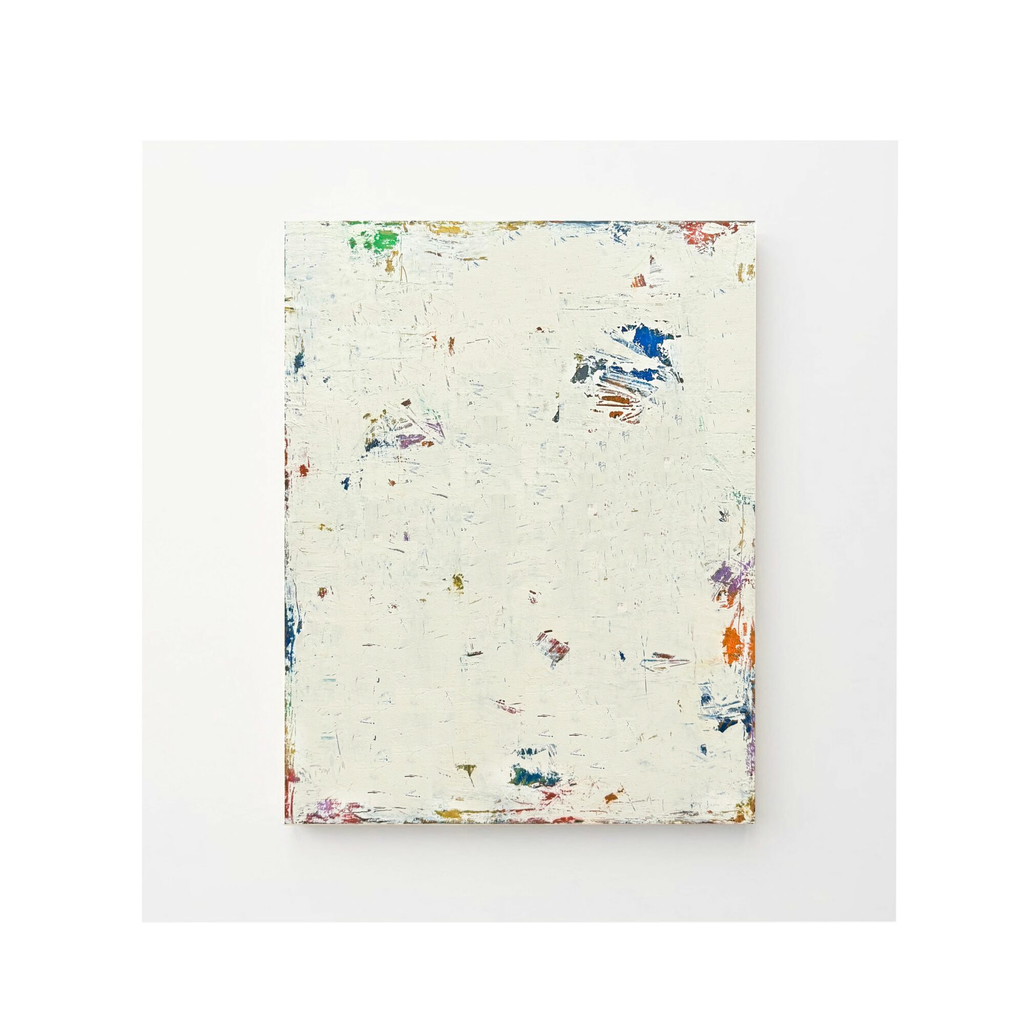 Blank canvas with paint splatters on a white background.