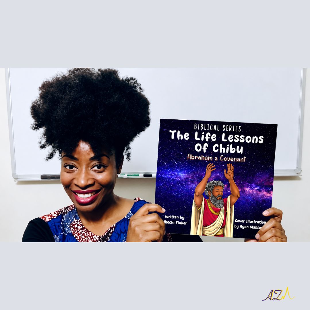 Woman with natural hair holding a book titled 'The Life Lessons of Chibu' in front of a whiteboard.