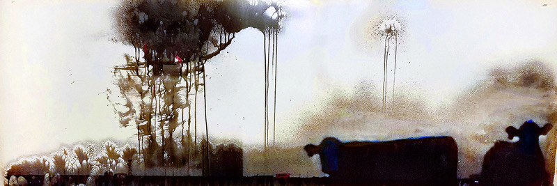 Abstract image with dark smudges and streaks on a light background, resembling smoke or ink splatters.