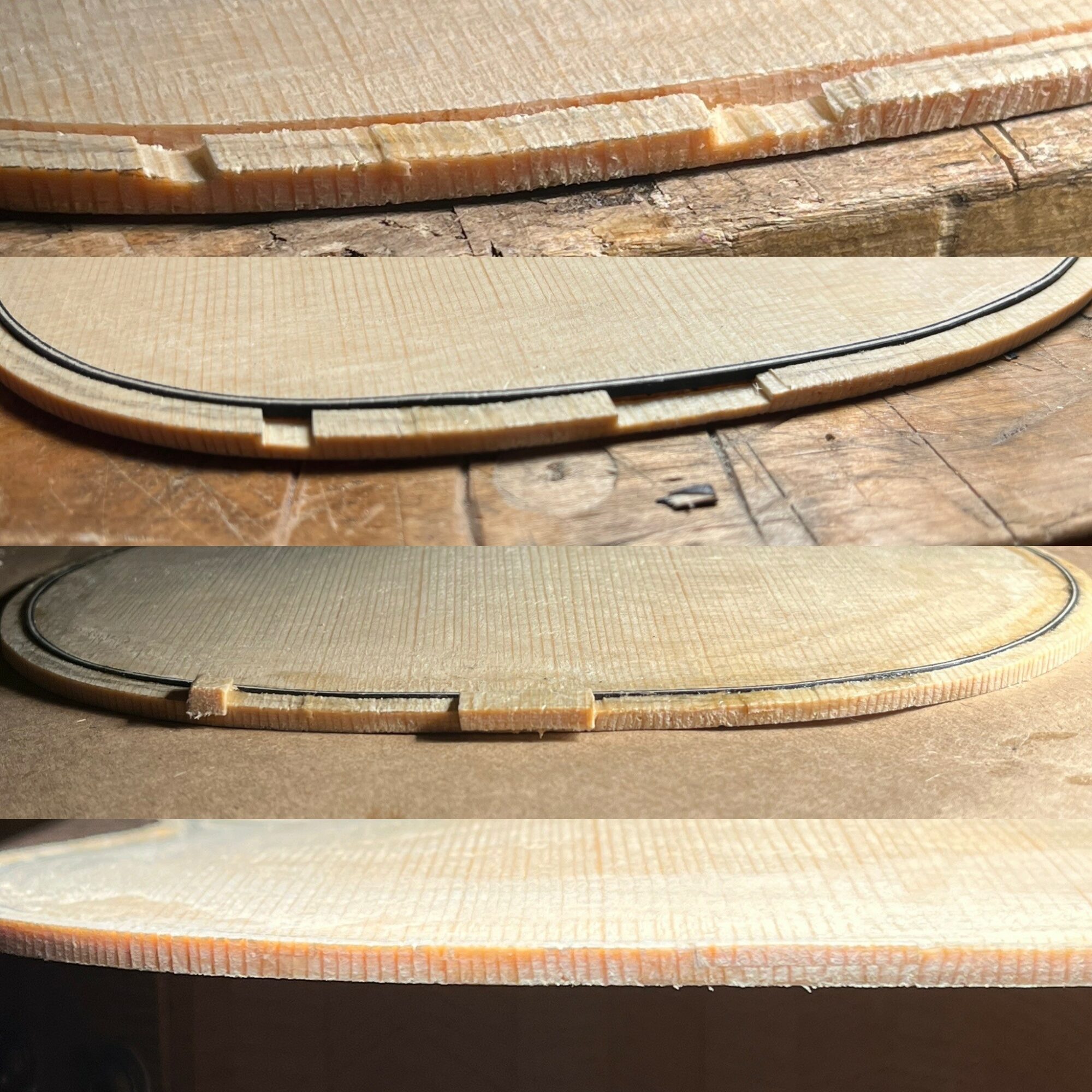 Close-up of stacked wooden objects with curved edges on a wooden surface.