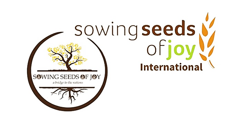 Logo with a tree, text about sowing seeds of joy, and a stylized wheat symbol, all within a circle.