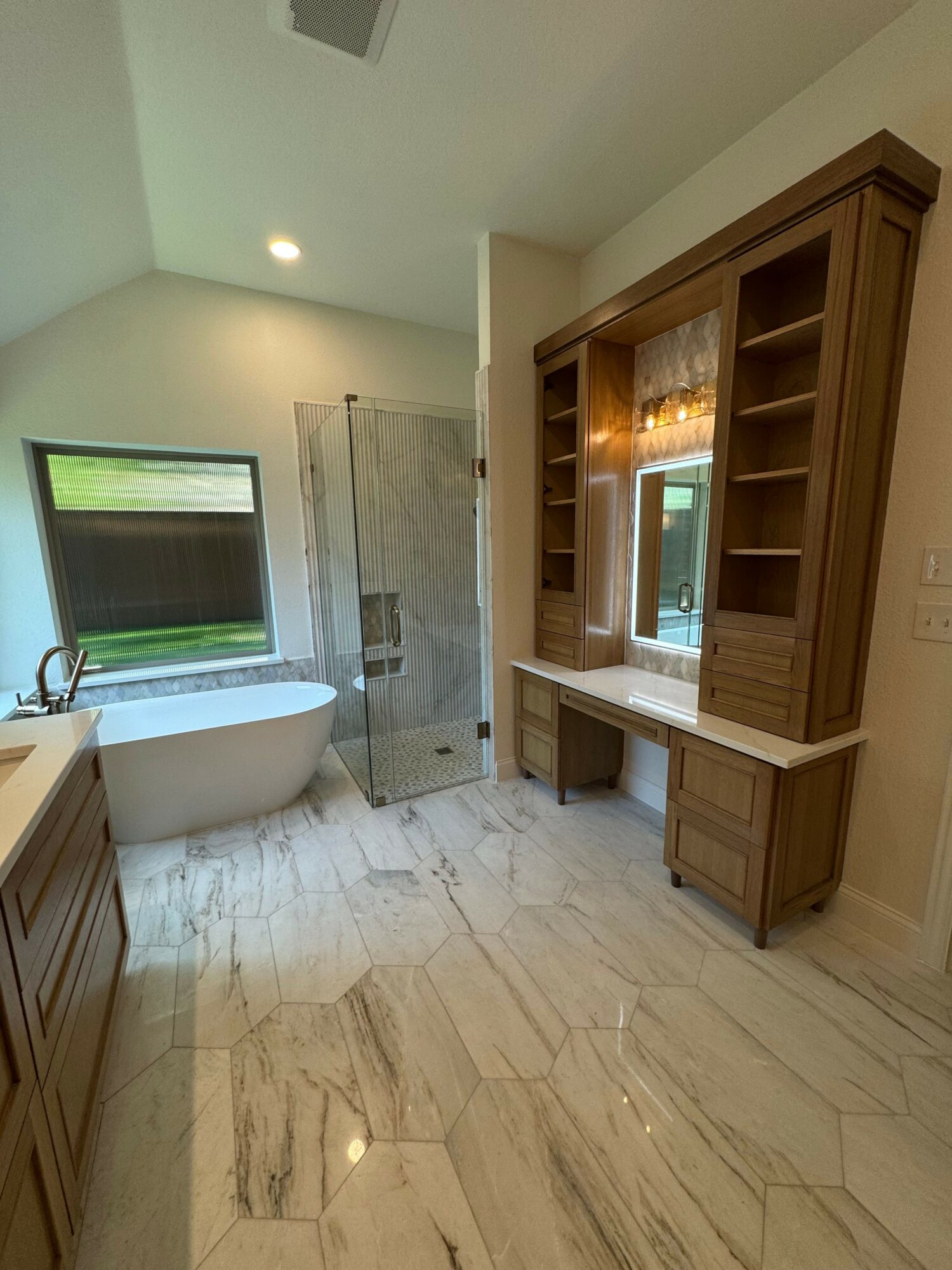 Living room with wooden furniture, marble floor, window with curtains, and a door leading outside.