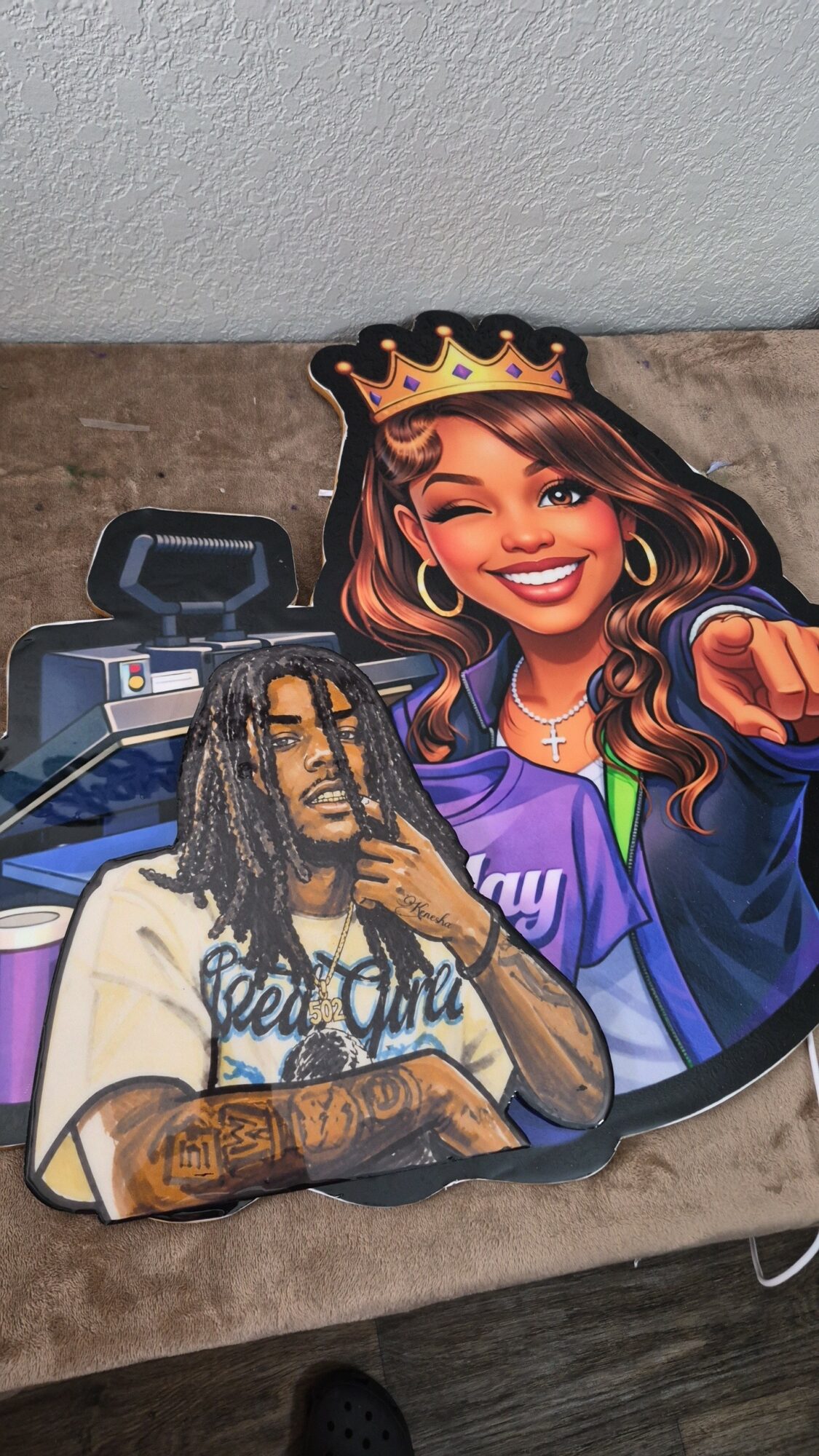 Colorful illustration of a smiling woman wearing a crown and a young man with dreadlocks, both in casual clothing.