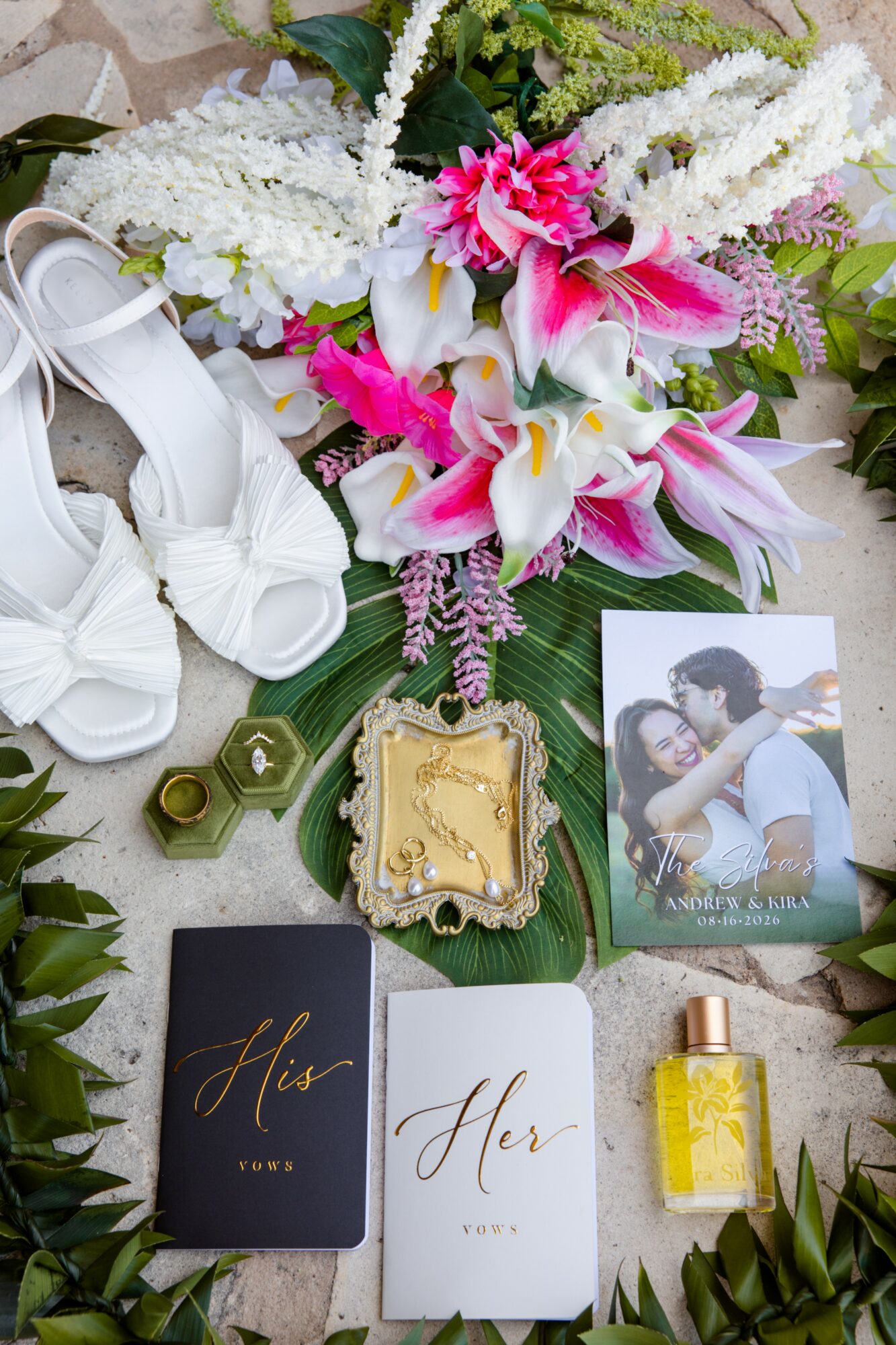Wedding bouquet with white and pink flowers, white shoes, a photo of a couple, and various cards and decorative items.