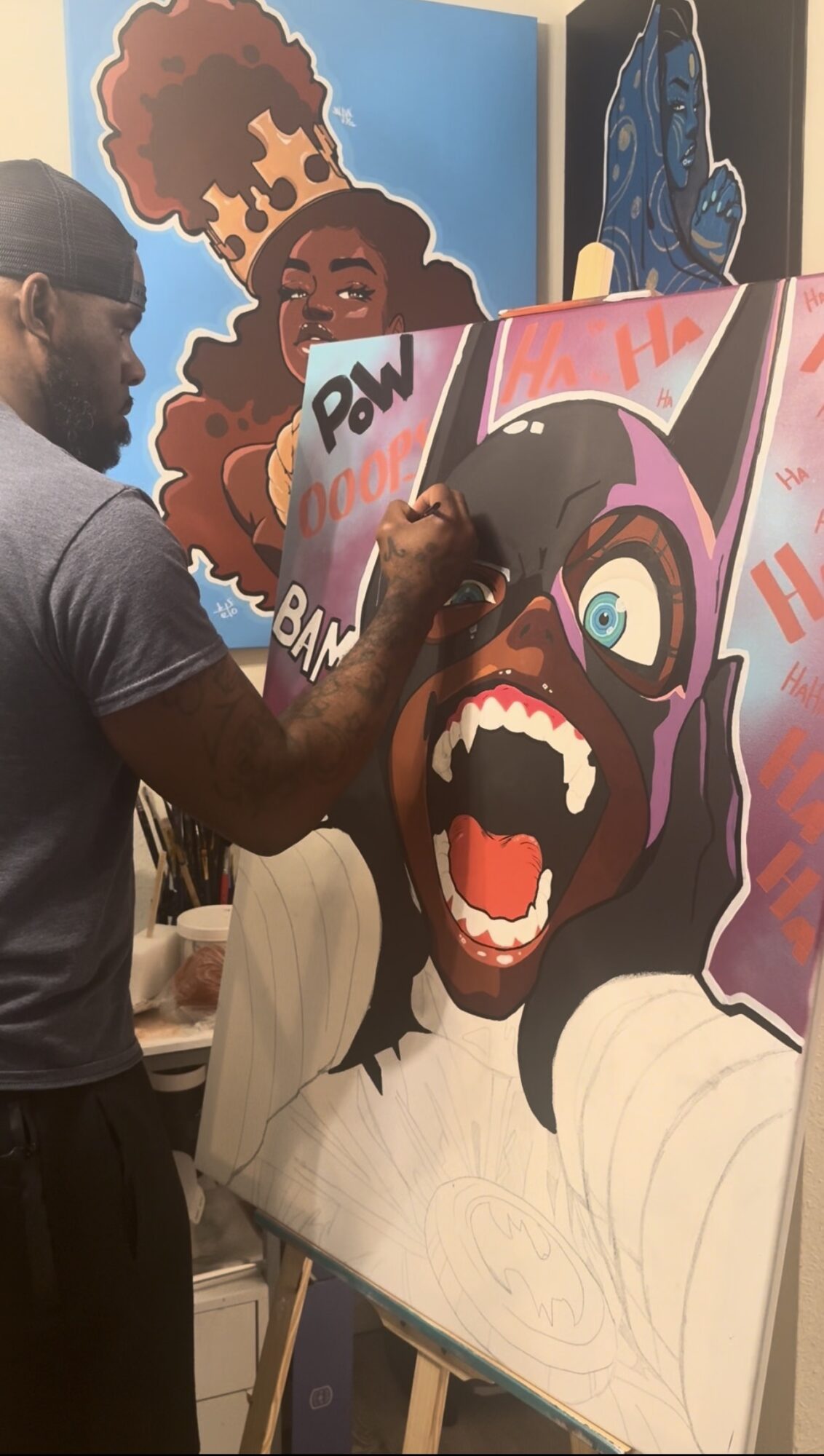 Artist painting a colorful, expressive portrait of a woman with purple hair and exaggerated facial features.