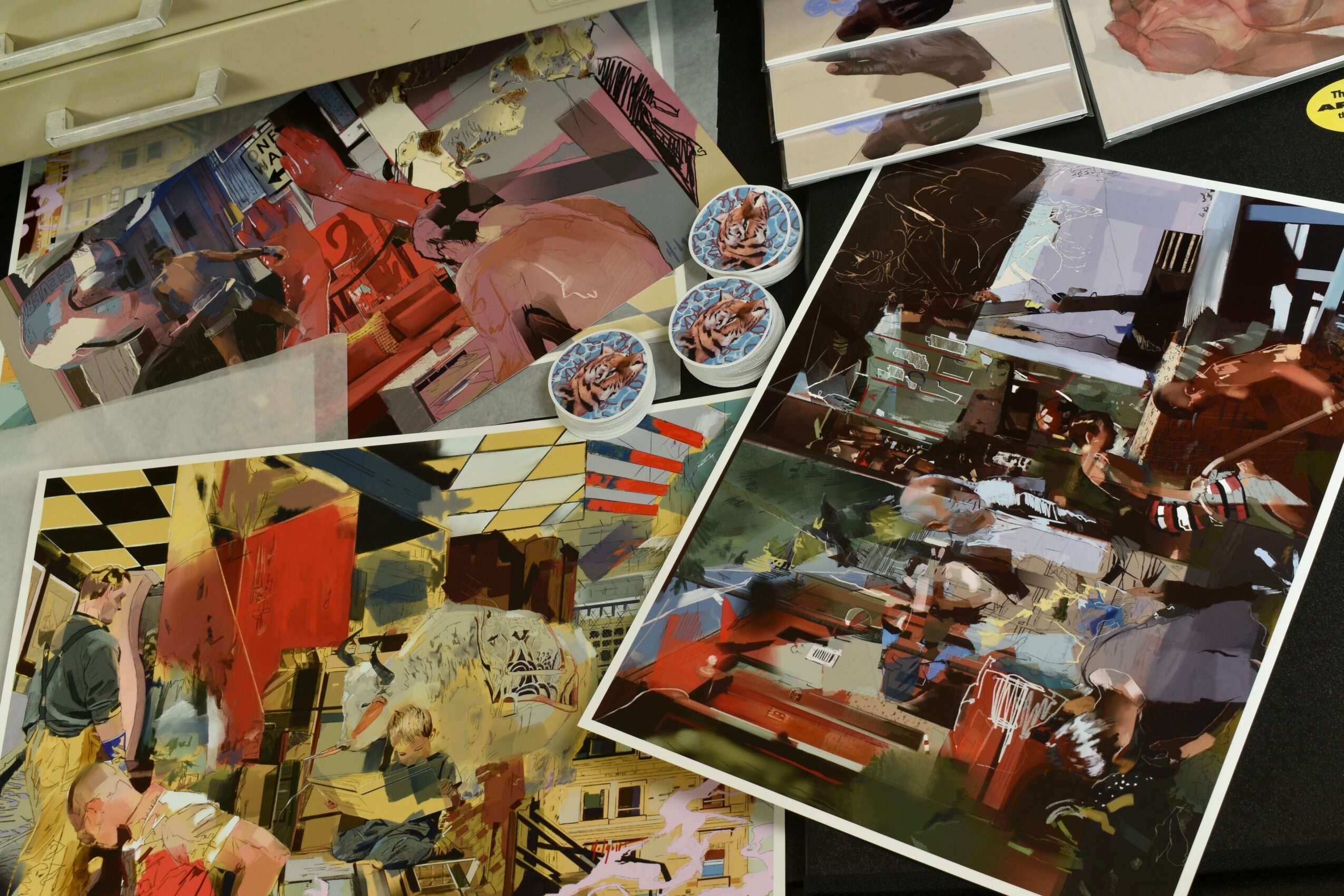 Collection of various photographs, including food, people, and outdoor scenes, scattered on a surface.