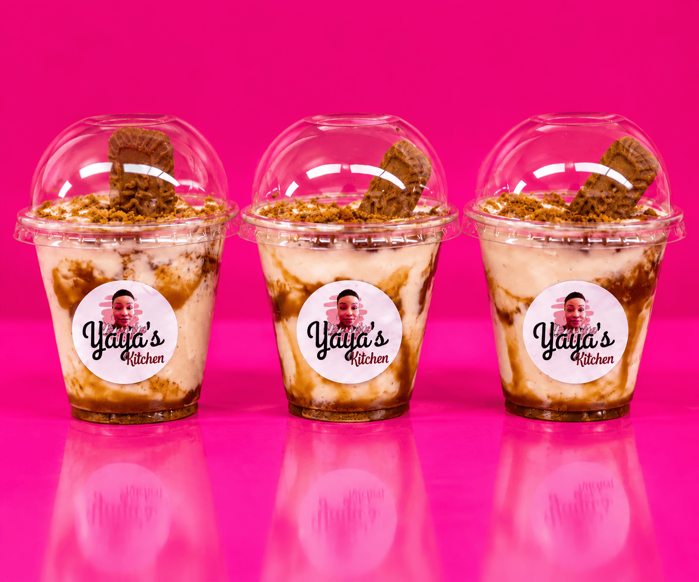 Three dessert cups with cookies and cream, on a pink background, with a logo reading 'Yaya's Kitchen'.