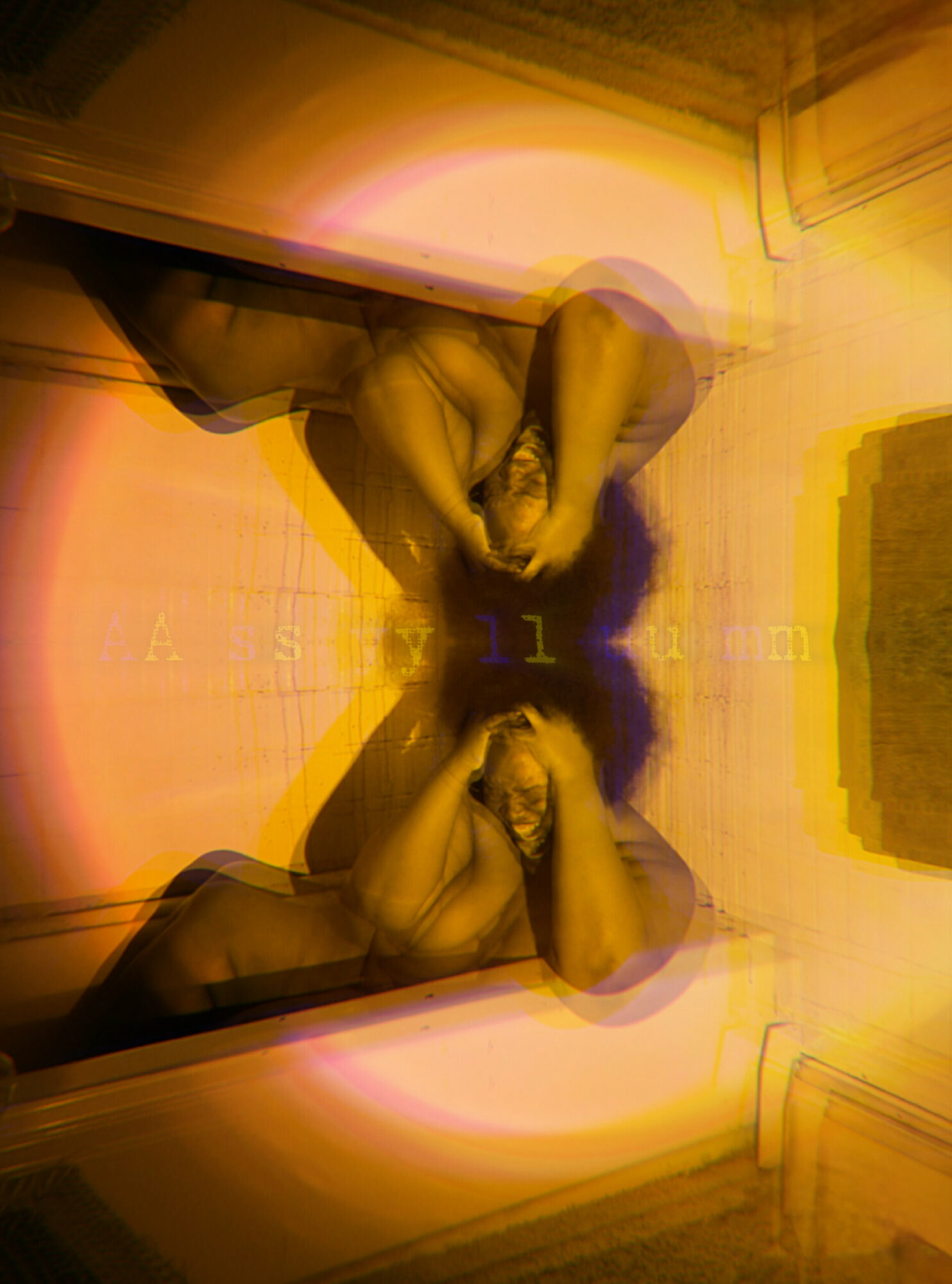 Person sitting on the floor with head resting on hands, reflected in a mirror, with warm lighting and a textured wall.